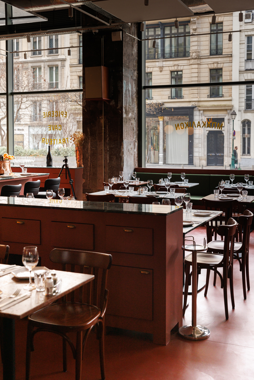 red floor anchors parisian restaurant ypseli with steel and marble textures - 4