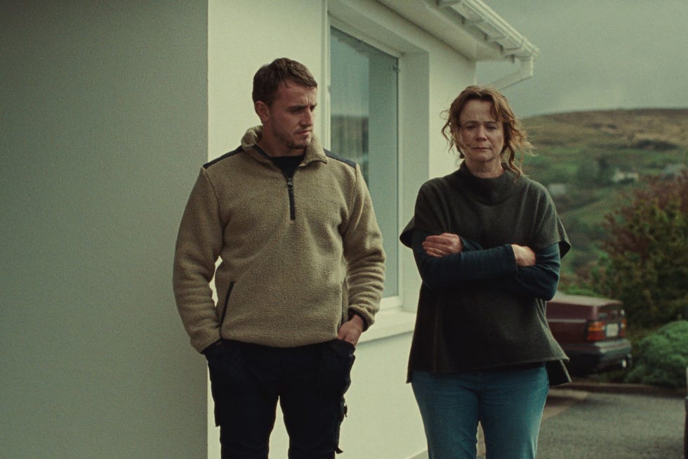 emily watson and paul mescal standing outside and looking moody in god's creatures
