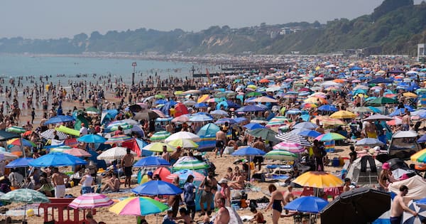 Parts of UK swelter in record-high May temperatures