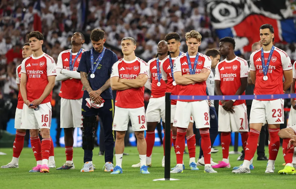 Players of Arsenal appear dejected after receiving their Runners Up Medals following the team's defeat in the UEFA Champions League Final 2026 match between Paris Saint-Germain and Arsenal