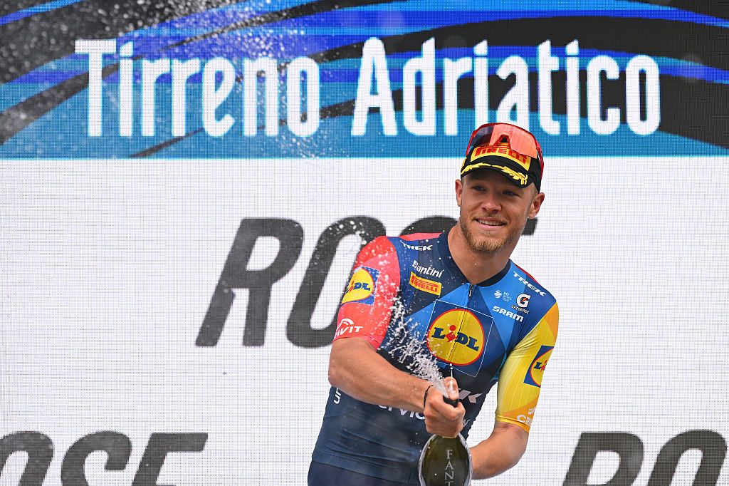 SAN BENEDETTO DEL TRONTO, ITALY - MARCH 15: Jonathan Milan of Italy and Team Lidl - Trek celebrates at podium as stage winner during the 61st Tirreno-Adriatico 2026, Stage 7 a 142km stage from Civitanova Marche to San Benedetto del Tronto / #UCIWT / on March 15, 2026 in San Benedetto del Tronto, Italy. (Photo by Tim de Waele/Getty Images)