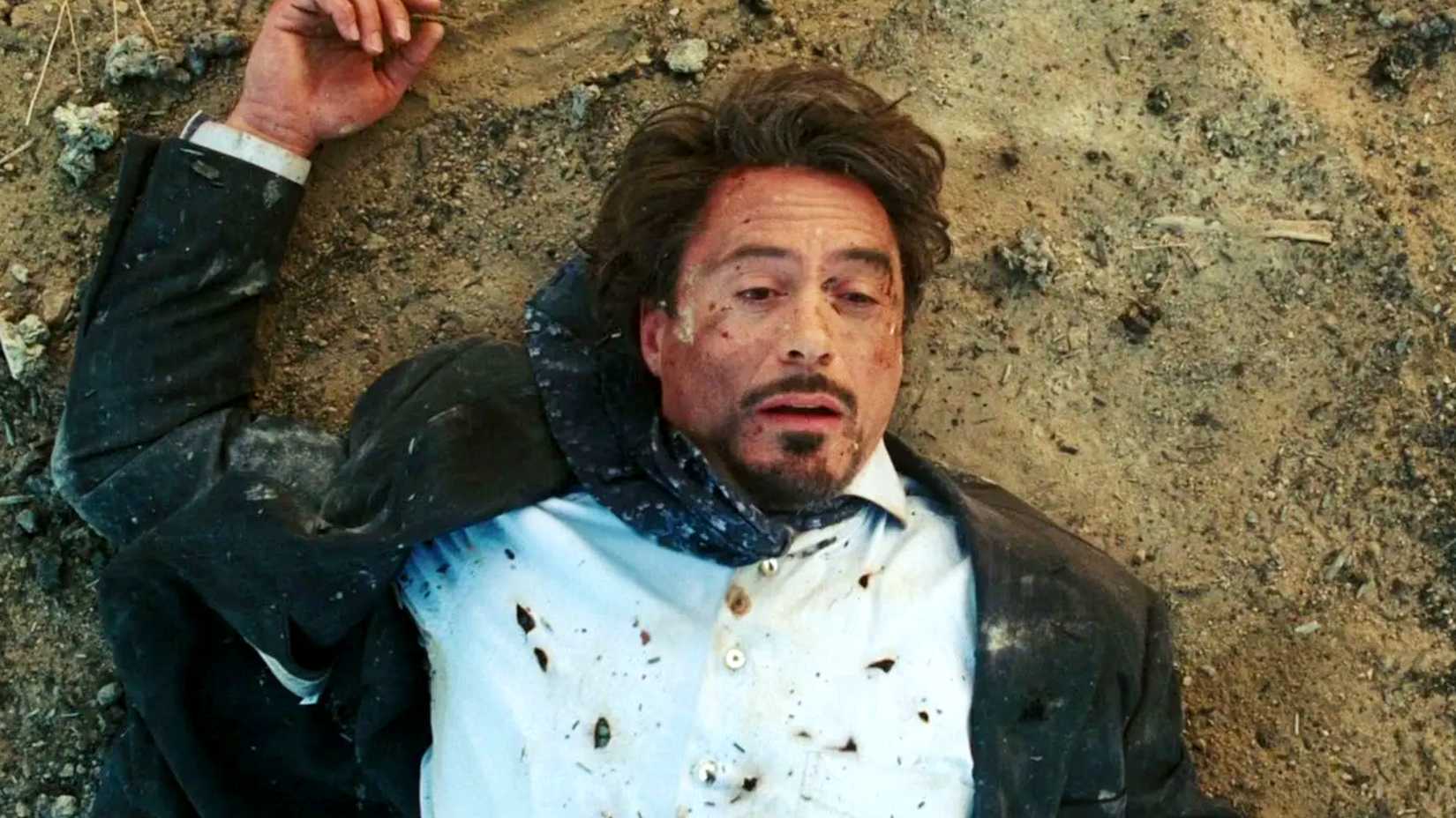 Robert Downey Jr as Tony Stark injured on the ground in 2008's Iron Man