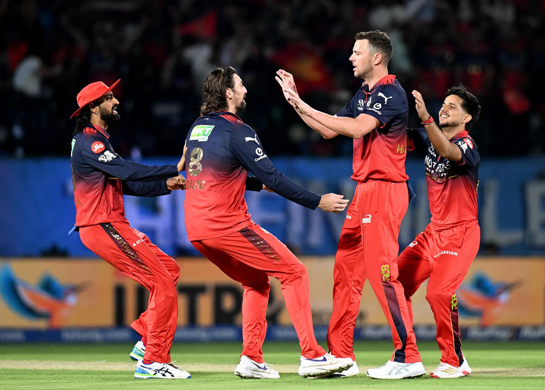 RCB's Josh Hazlewood and teammates celebrate a wicket. (ANI Photo) Royal Challengers Bengaluru