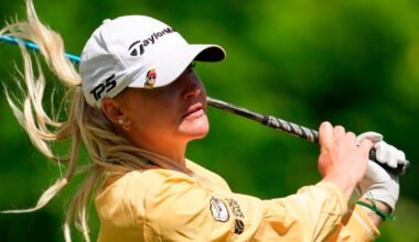 Charley Hull plays her shot on the seventh hole during the first round of the Queen City Championship LPGA golf tournament