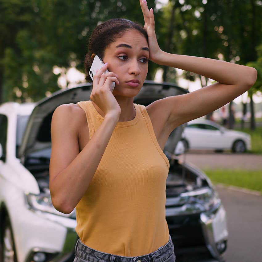 woman stressed about broken down car