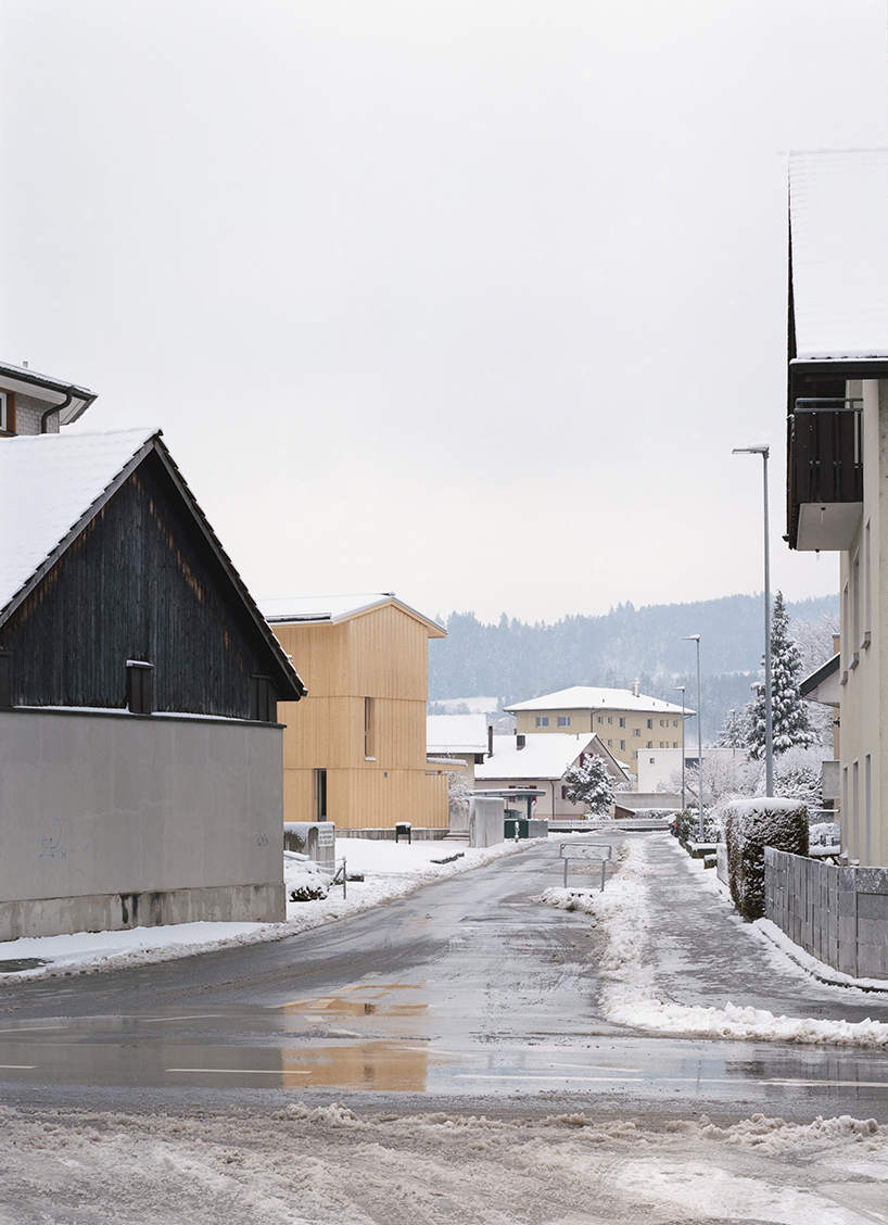 the tower house explores vertical living through prefabricated timber design 2