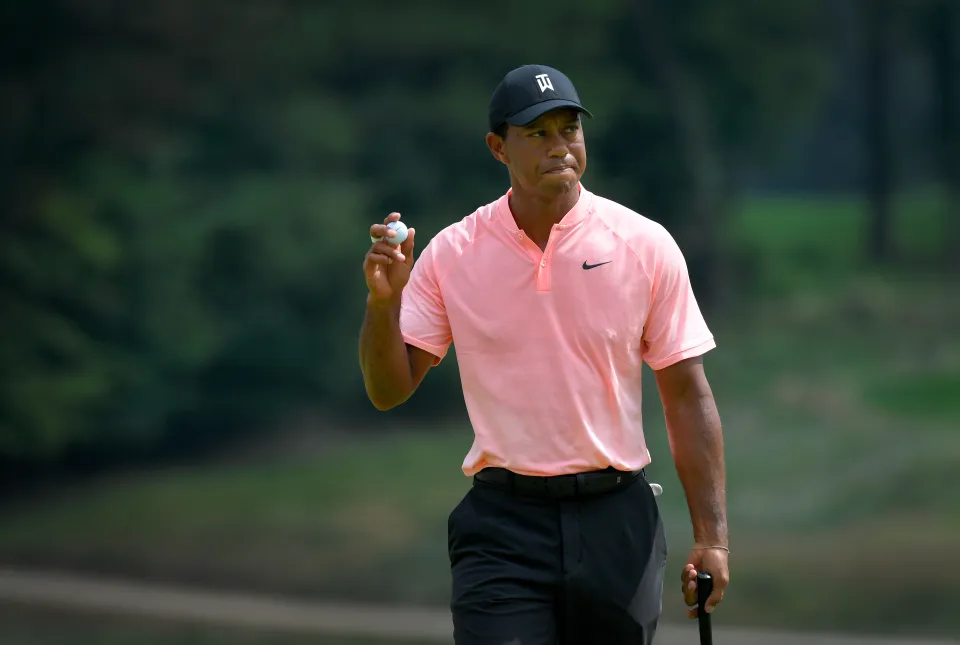 Tiger Woods acknowledges the gallery on the 16th hole during the second round of the BMW Championship at Aronimink Golf Club on September 7, 2018 in Newtown Square, Pennsylvania.