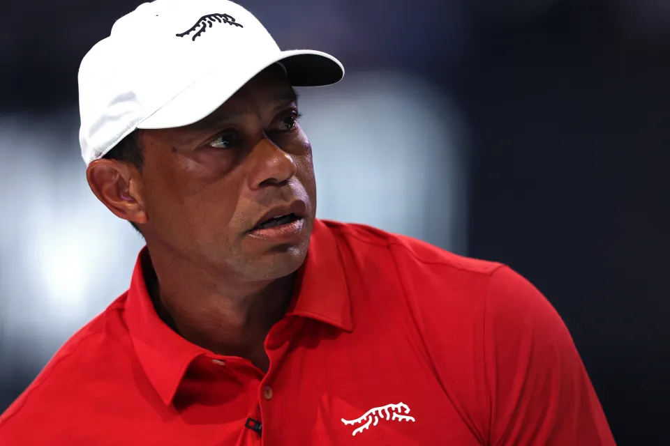 Tiger Woods of Jupiter Links Golf Club looks on