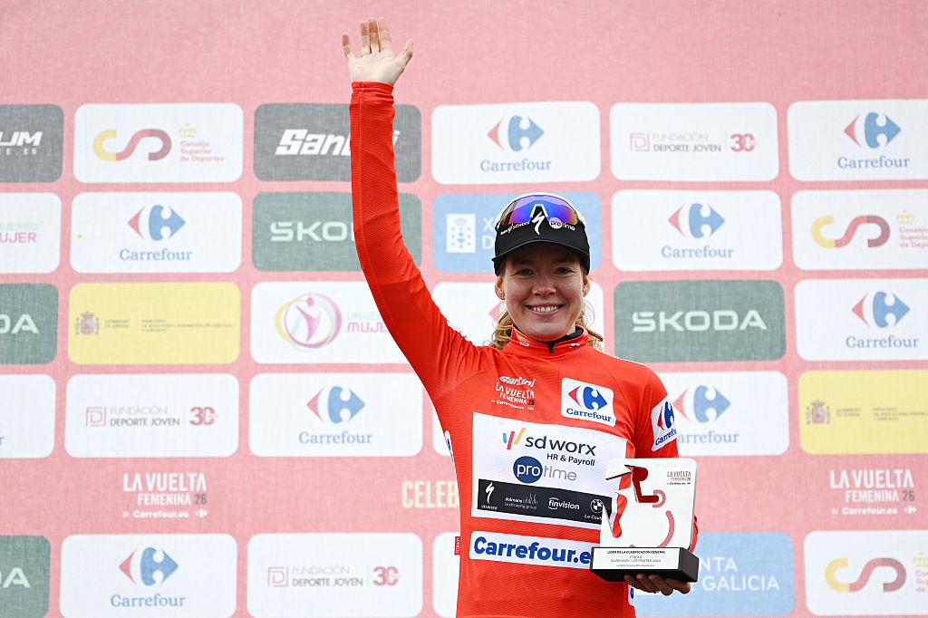 NAVA, SPAIN - MAY 08: Anna van der Breggen of Netherlands and Team SD Worx - Protime celebrates at podium as Red Leader Jersey winner during the 12th La Vuelta Femenina 2026, Stage 6 a 106.5km stage from Gijon / Xixon to Les Praeres. Nava 738m / #UCIWWT / on May 08, 2026 in Nava, Spain. (Photo by Szymon Gruchalski/Getty Images)