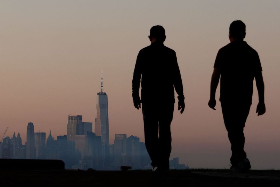 Walkers and cityscape