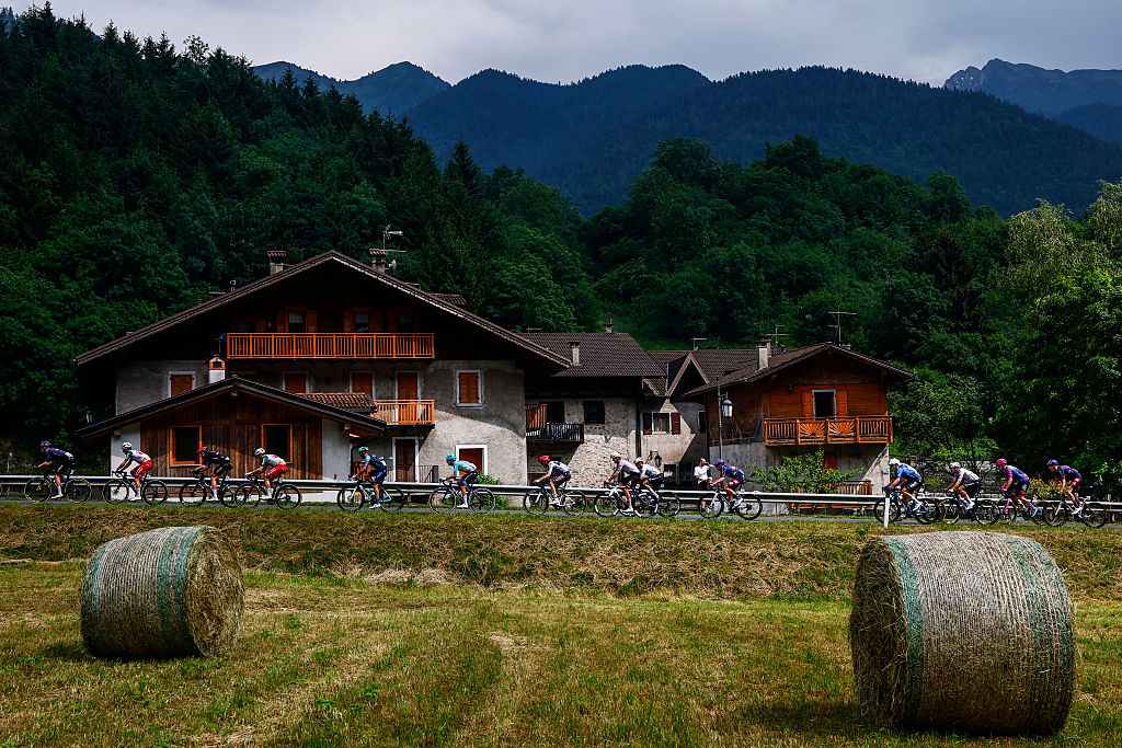 The chasing group rides during the 17th stage of the Giro d'Italia 2026 - Tour of Italy cycling race between Cassano d'Adda and Andalo, Italy, on May 27, 2026. (Photo by Luca Bettini / AFP)
