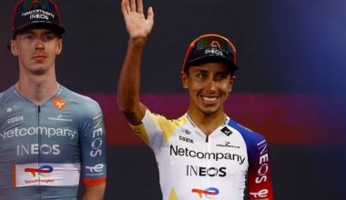 Egan Bernal smiles and waves on stage during the Giro d'Italia team presentation