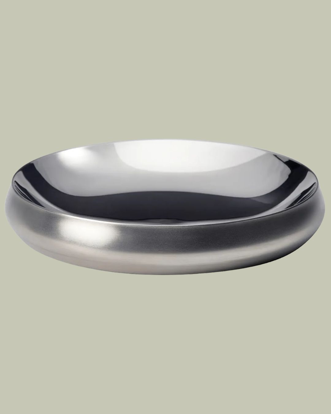 IKEA AFTONHAJ Serving Bowl, Stainless Steel against pale green background.