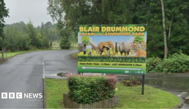 Sign for Blair Drummond Safari Park, featuring zoo animals including an elephant, Giraffe, zebra, tiger and rhino