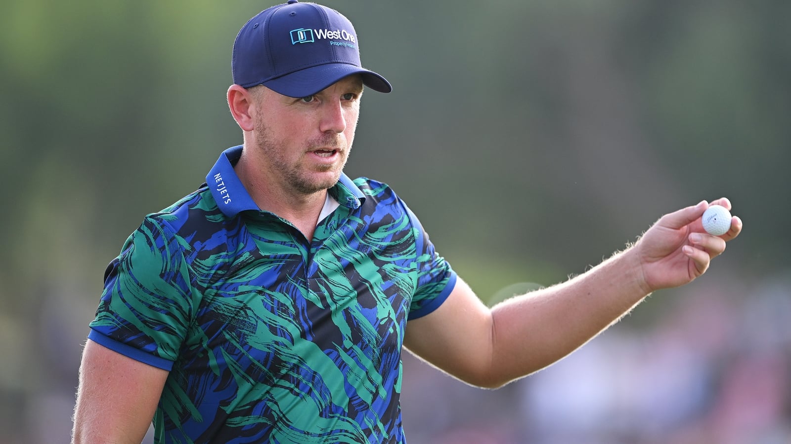 Wallace breaks course record, McKibbin well placed