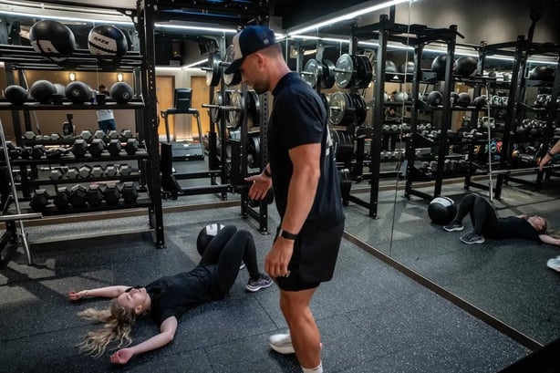Eleanor lying on the gym floor