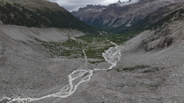 meltwater flowing from the Morteratsch glacier descends into a gravel-covered basin the glacier once filled on June 2, 2026 near Pontresina, Switzerland