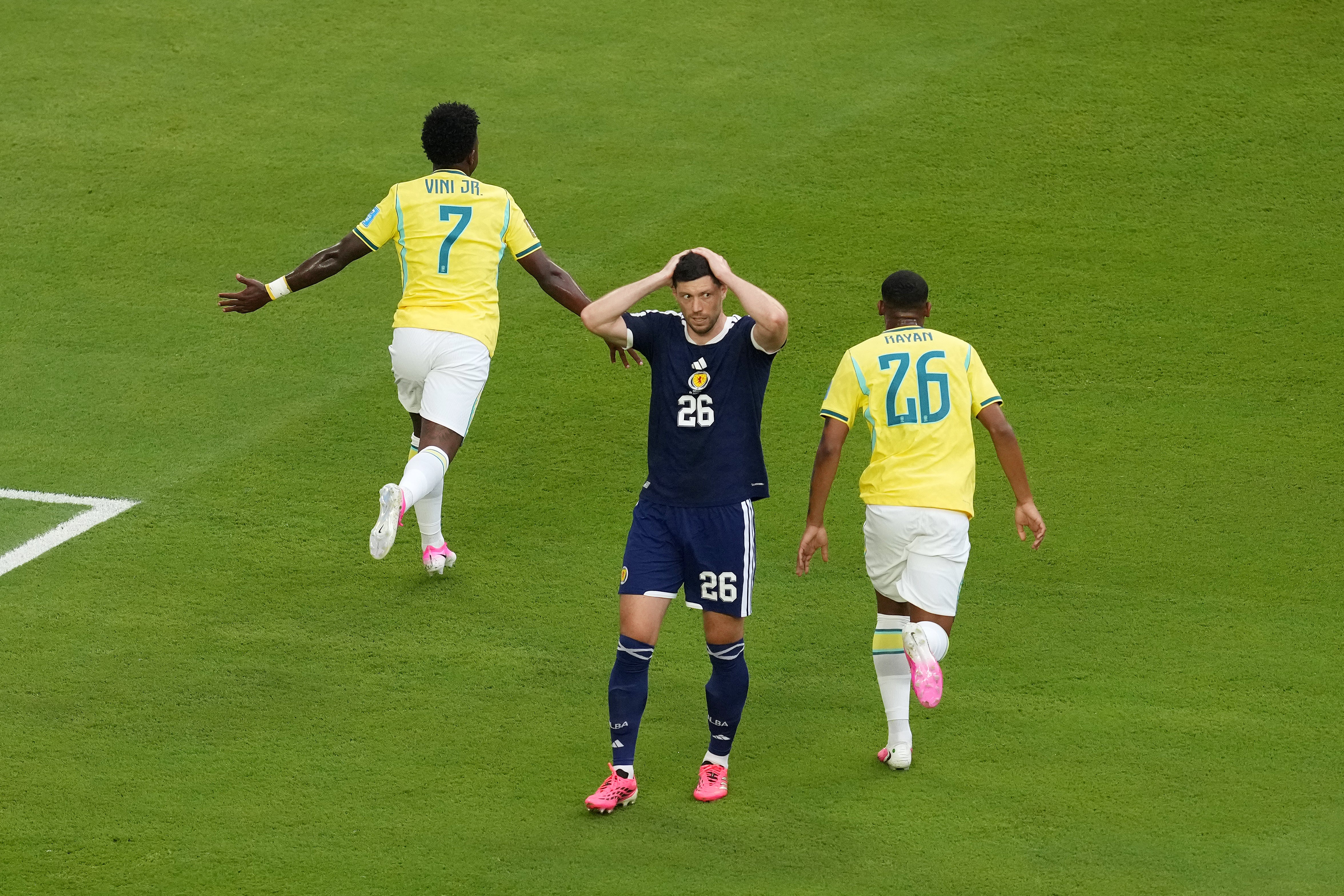 Scott McKenna was caught in possession leading to Brazil’s opening goal