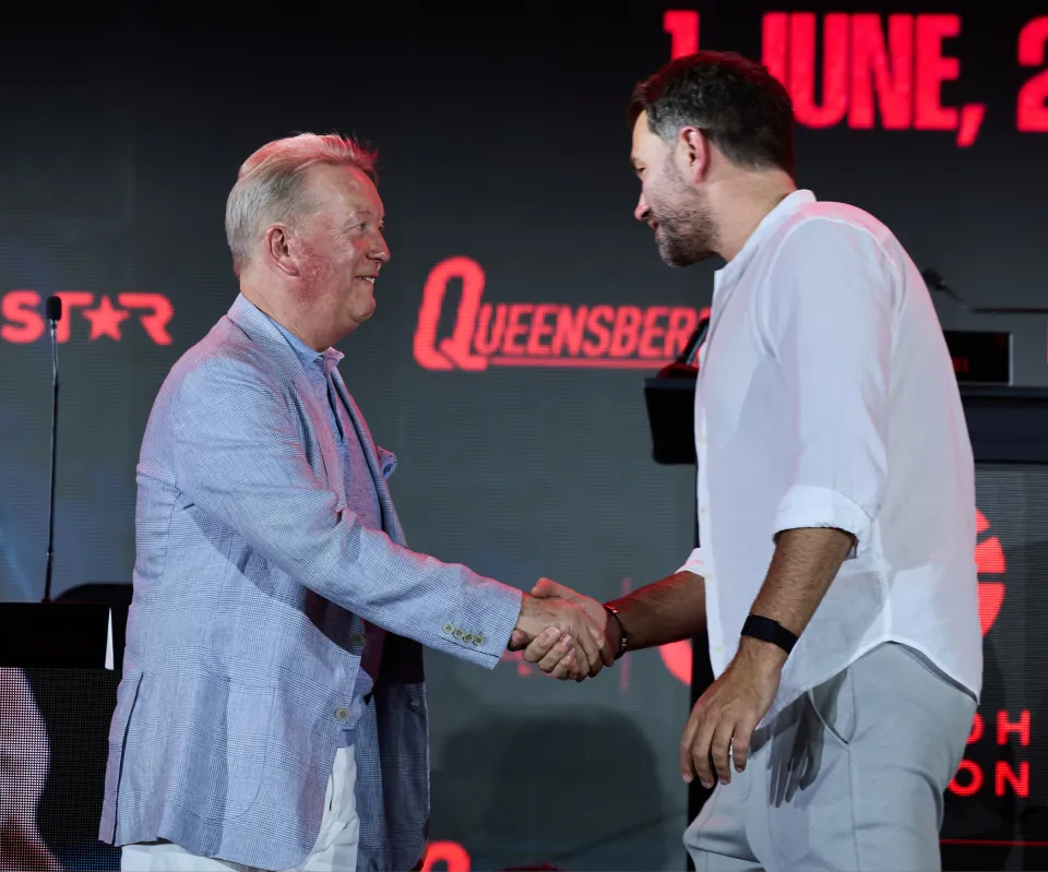 Frank Warren and Eddie Hearn shaking hands