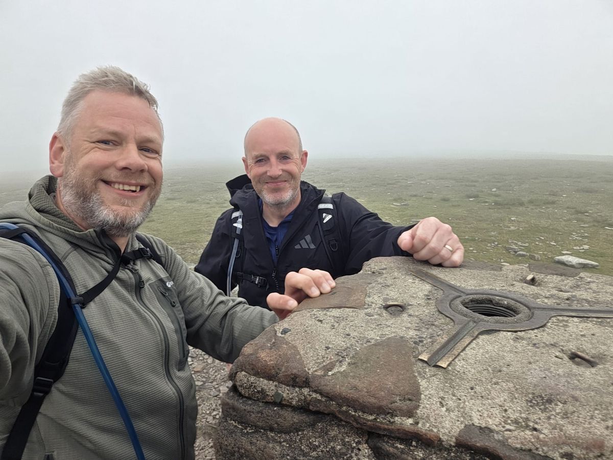 Pete and Nick Bloor on a foggy day at the summit of one of the Yorkshire Three Peaks