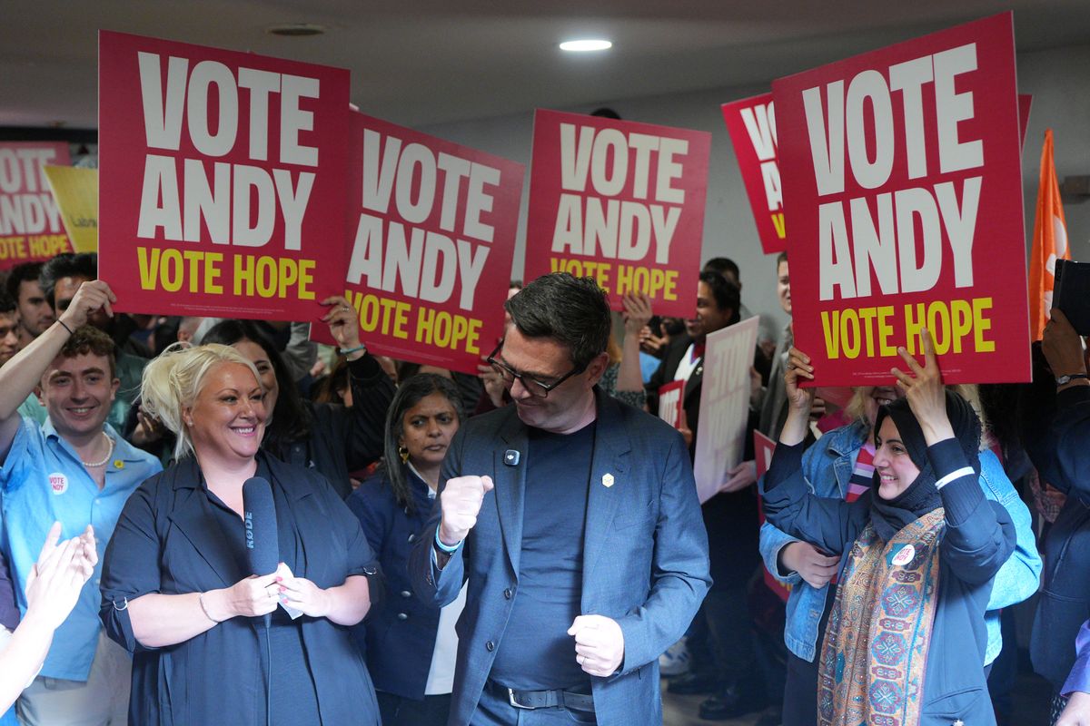 Andy Burnham delivers a speech at St Jude's ARLFC, in Wigan