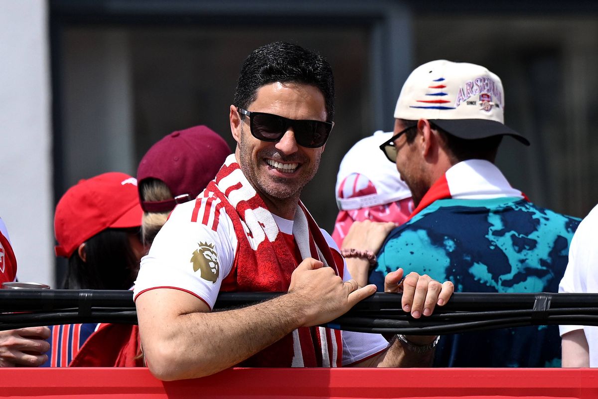 Mikel Arteta, Manager of Arsenal, reacts on the open top bus during the Arsenal Trophy Parade