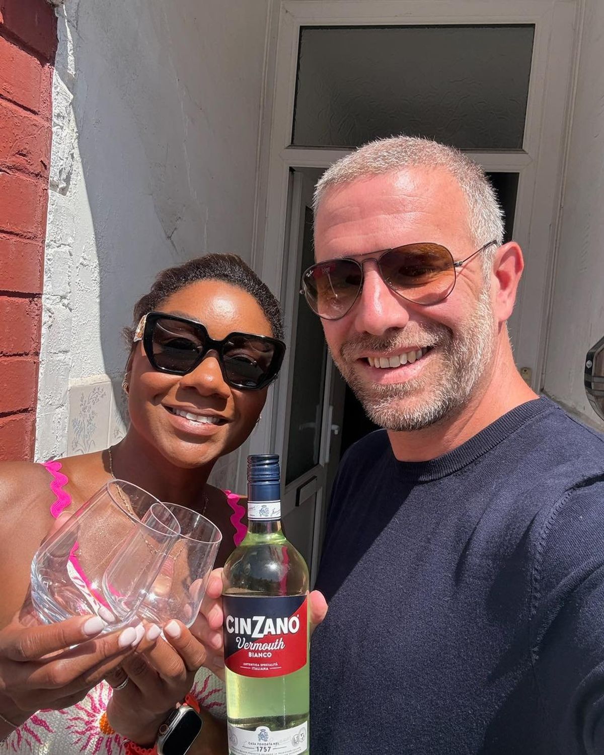Couple with a bottle of Cinzano