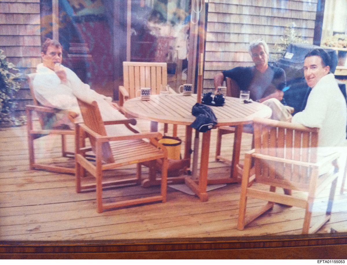 An image released in the Epstein fles which appears to show Andrew Mountbatten-Windsor with Jeffrey Epstein and Peter Mandleson