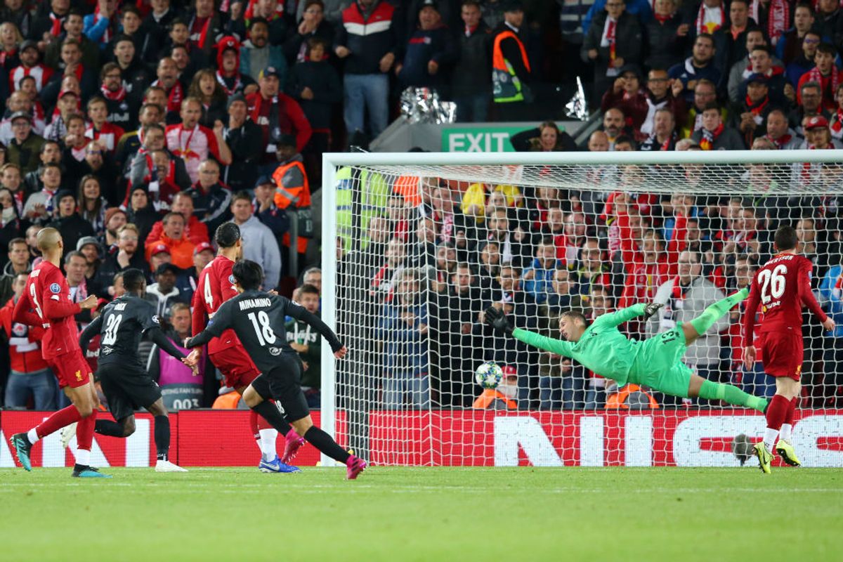 LIVERPOOL, ENGLAND - OCTOBER 02: Takumi Minamino of Red Bull Salzburg scores his sides second goal during the UEFA Champions League group E match between Liverpool FC and RB Salzburg at Anfield on October 02, 2019 in Liverpool, United Kingdom. (Photo by Alex Livesey/Getty Images)