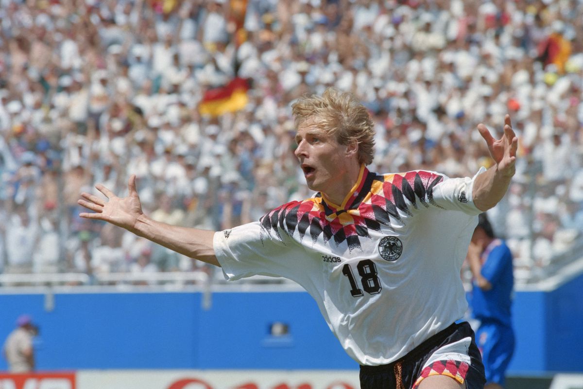 German Jürgen Klinsmann reacts after scoring the first goal during the World Cup match against South Korea