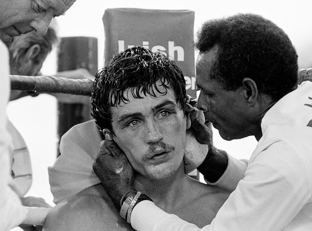 Irish featherweight boxer Barry McGuigan with his trainer between rounds during his world featherweight fight against Steve Cruz, Las Vegas, 23rd June 1986