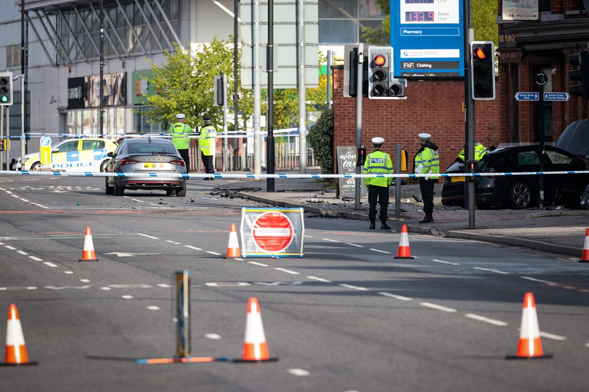 Police at the scene on Hyde Road