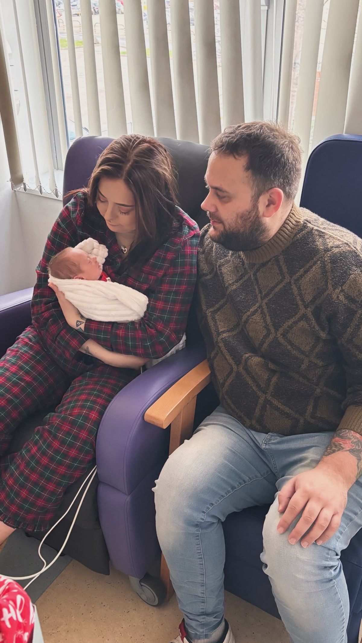 Helen Bennett and her daughter Cordelia were saved following an emergency C-section - pictured with husband James