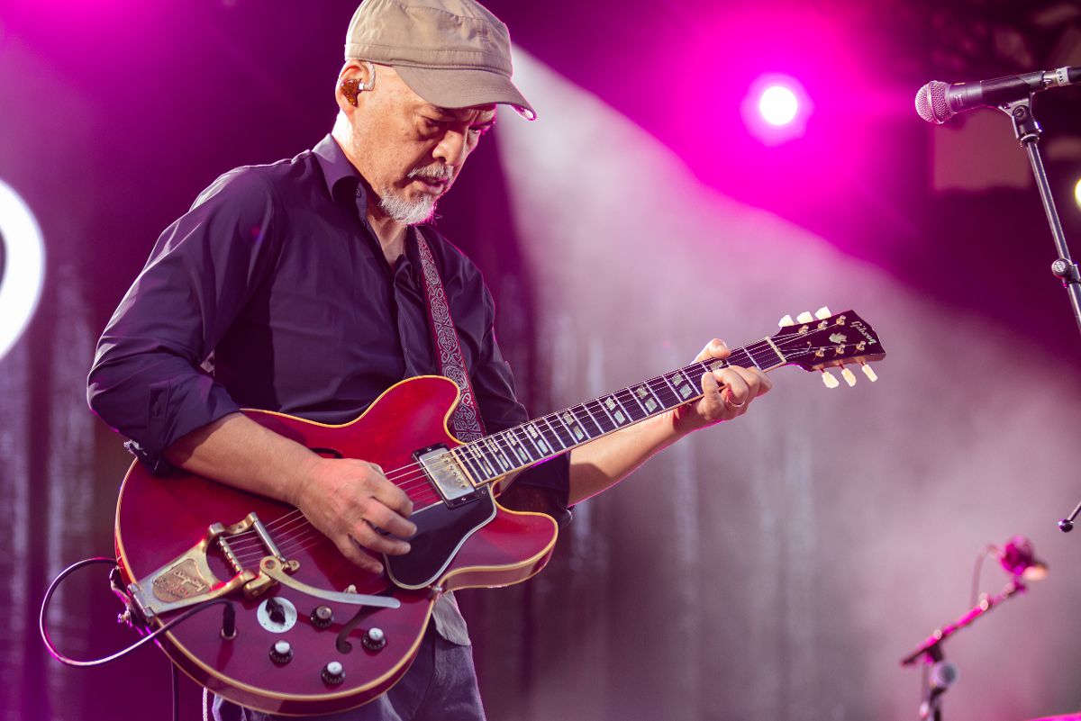 Joey Santiago, Pixies' laidback guitar hero, on stage at the Eden Project