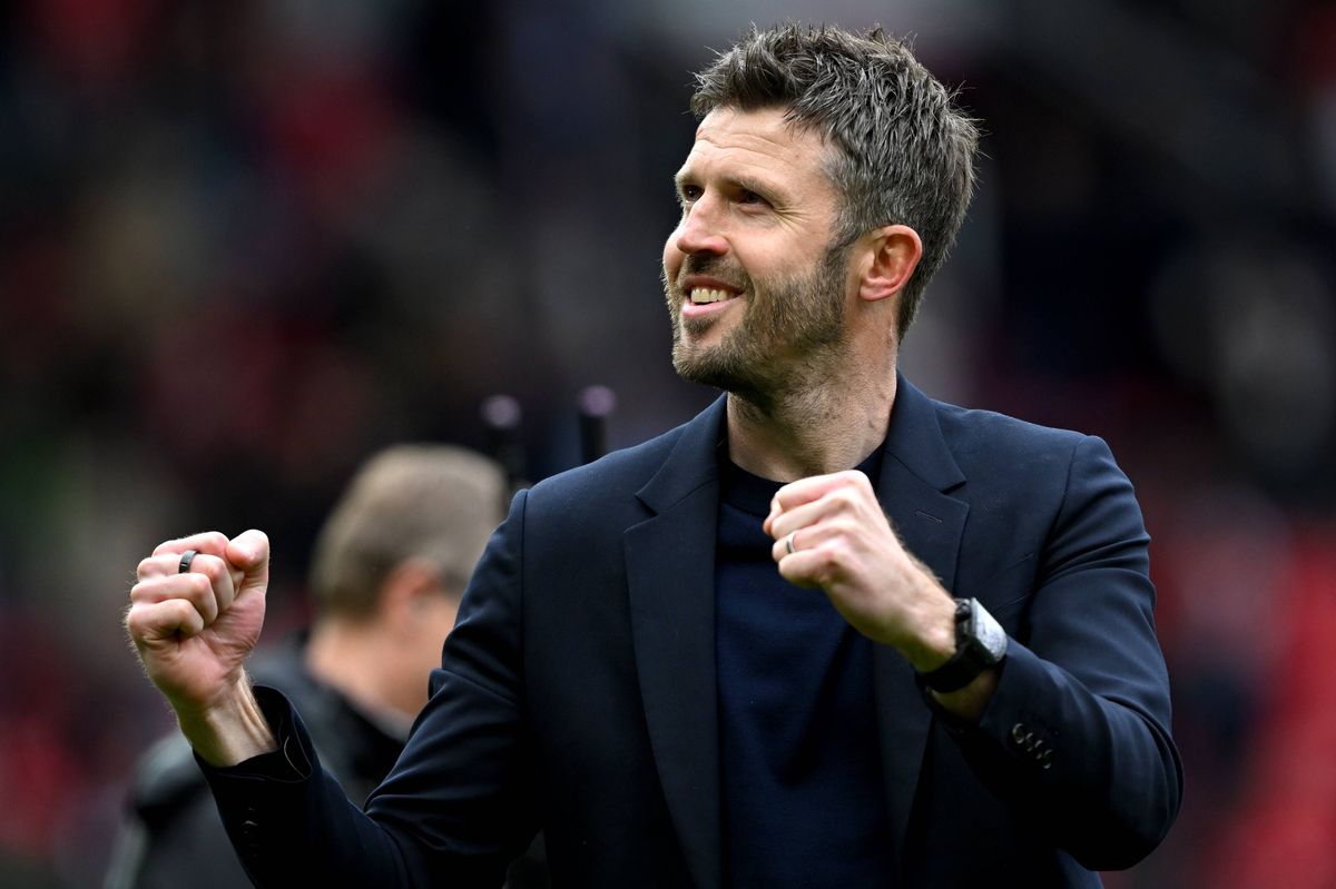 Michael Carrick, Manager of Manchester United, celebrates victory following the Premier League match between Manchester United and Liverpool at Old Trafford