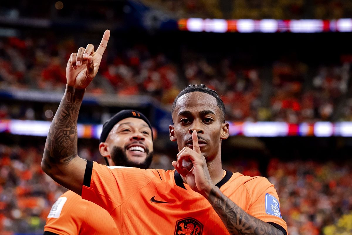 Memphis Depay of the Netherlands and Crysencio Summerville of the Netherlands celebrate after the 5-1 victory over Sweden during the FIFA 2026 World Cup Group F match between the Netherlands and Sweden at Houston Stadium on June 20, 2026, in Houston, United States
