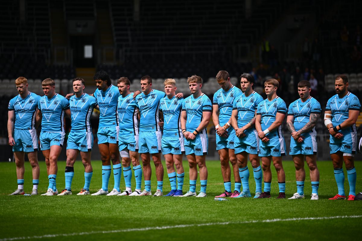  Hull FC stand for a minutes silence in memory of John Kear.