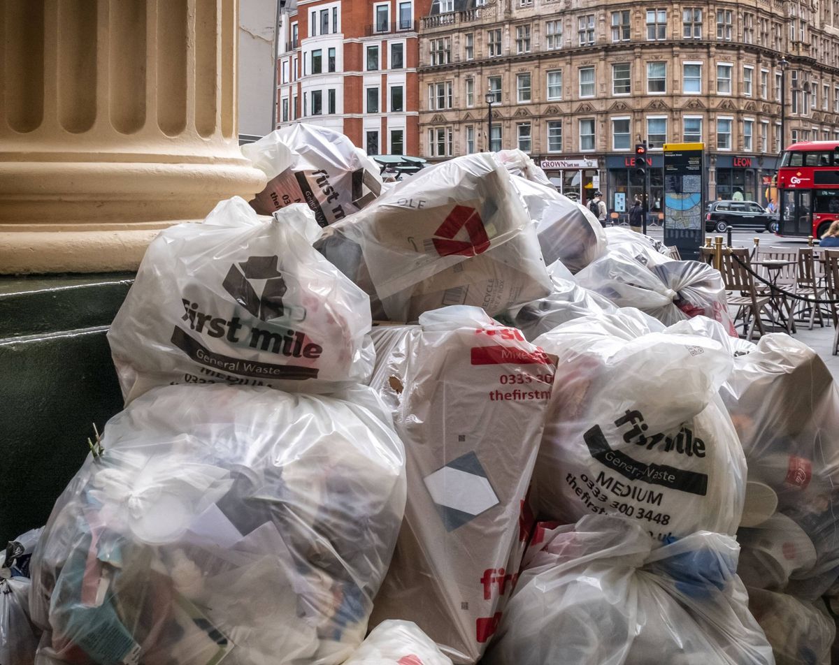 Pile of discarded rubbish in Wellington Street, London