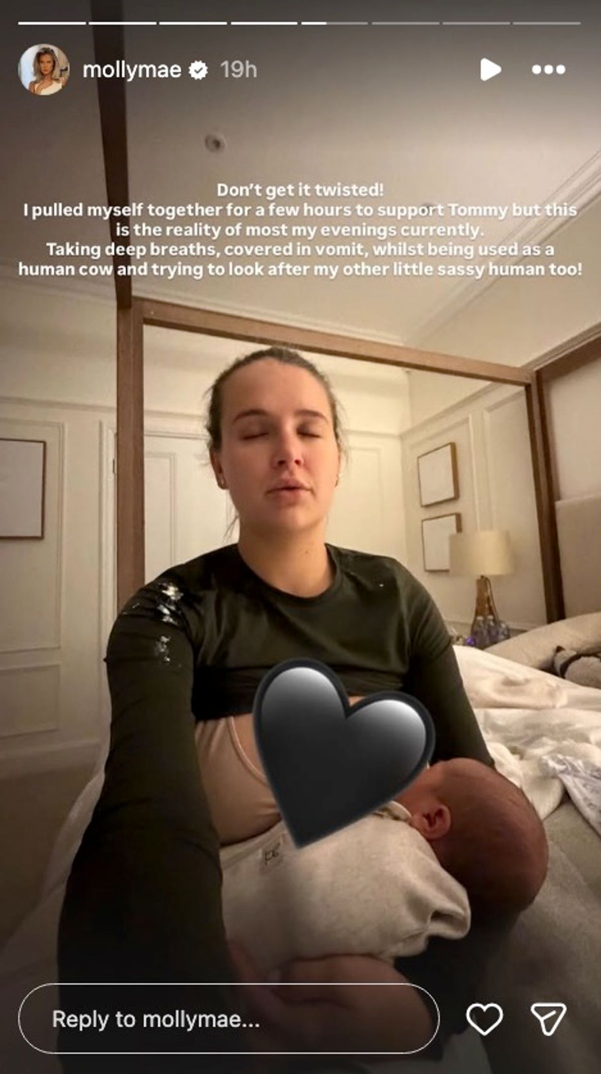 Molly-Mae also shared a candid snap of her current reality as she breastfed baby son Midas, with vomit on the shoulder of her top