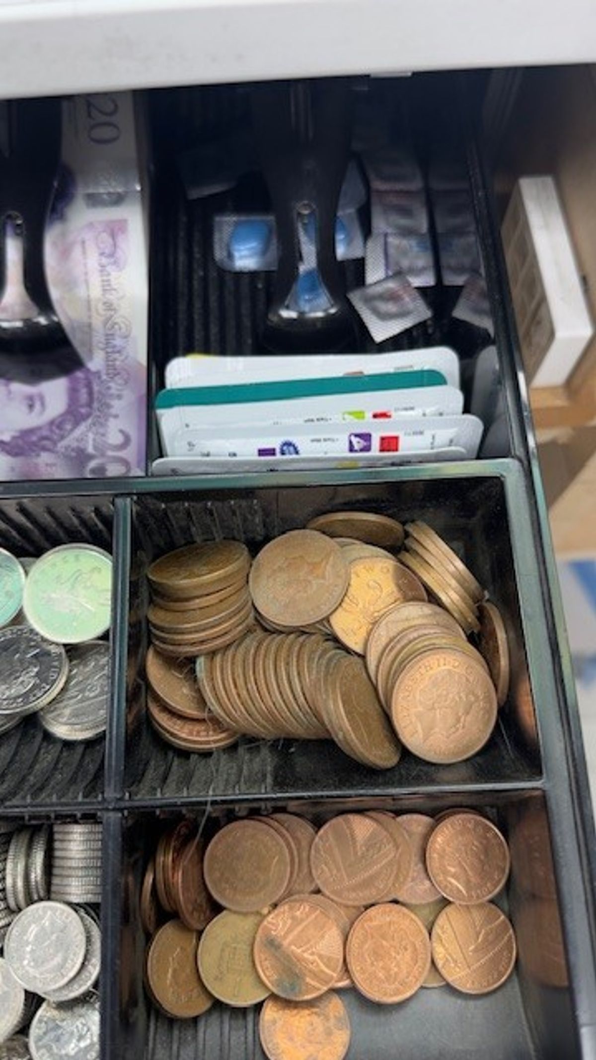 More tablets cut up individually were hidden in the till drawer (Liverpool Council)
