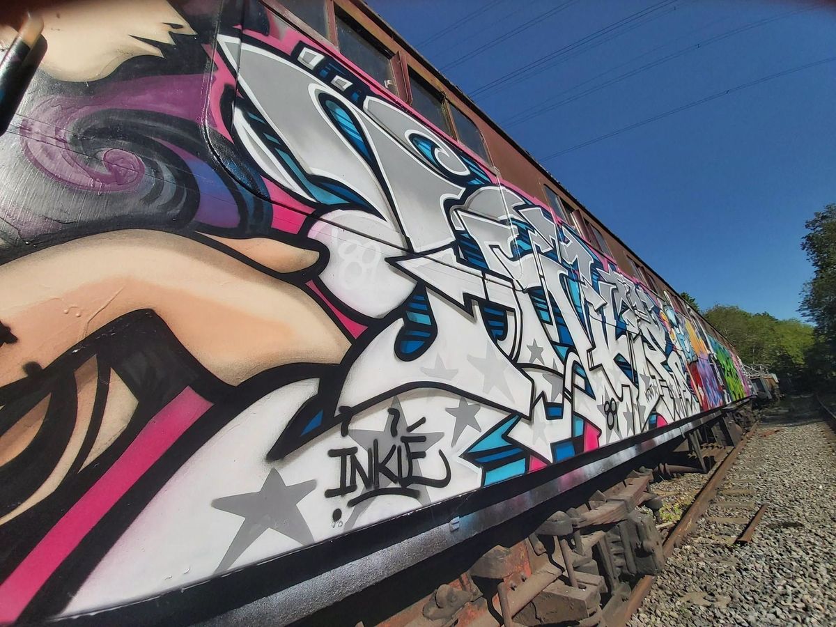 Bristol street artists Inkie, Cheo and Jody have been commissioned to decorate a heritage railway carriage in the style of the 1980s, at Avon Valley Railway in Bitton.