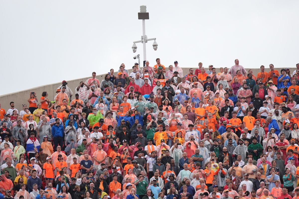 Fans wearing raincoats to protect themselves from rain during the 2026 FIFA World Cup First Stage Group F match between Tunisia and Netherlands at Arrowhead Stadium