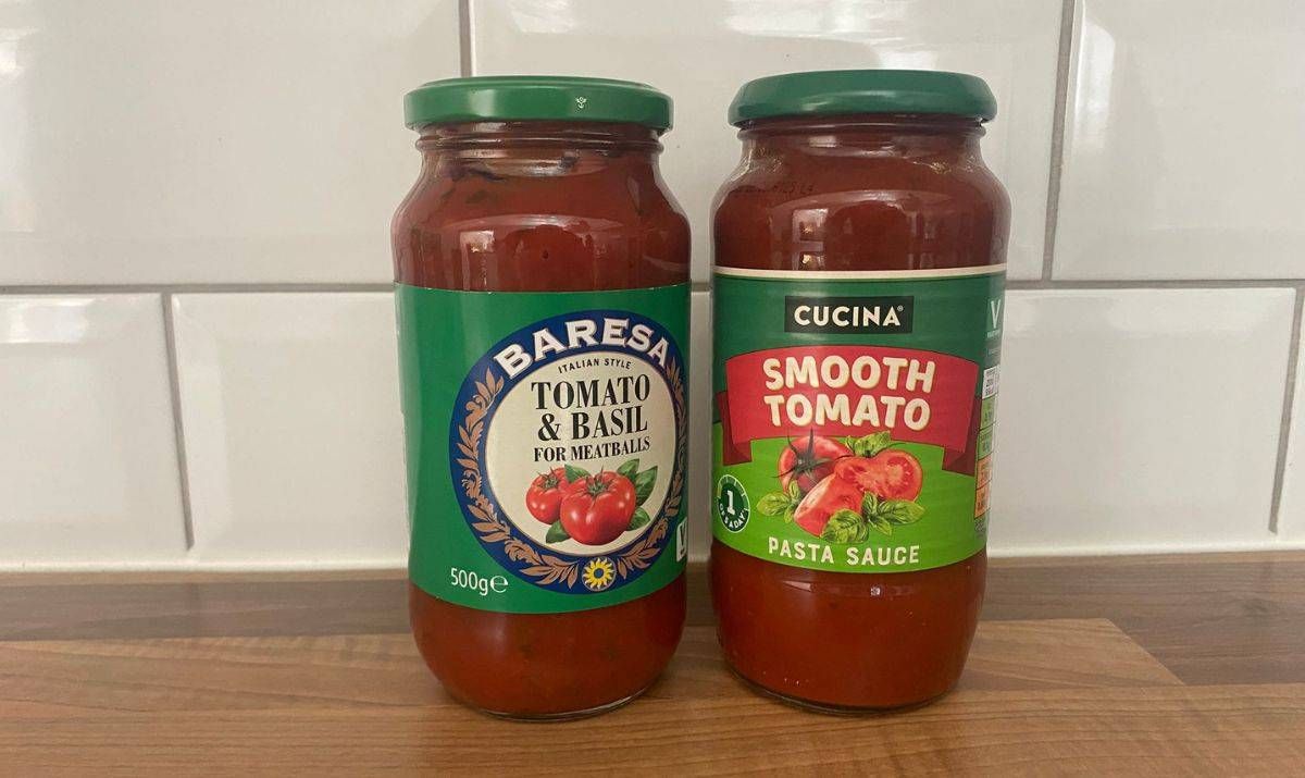 Two pasta sauce jars. One from ALdi, another from Lidl. Both tomato flavoured