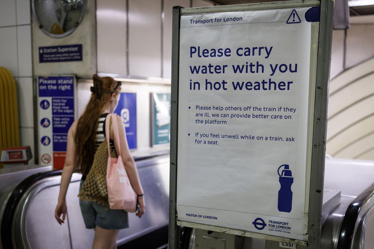 Mandatory Credit: Photo by TOLGA AKMEN/EPA/Shutterstock (16957624b)
A person goes past a sign warning passengers of the hot weather on the London Underground as the UK is set to experience its hottest June day on record during a heatwave in London, Britain, 24 June 2026. The Met Office has issued its second ever red warning for extreme heat, as temperatures are expected to reach at least 39 Celsius, with some areas potentially reaching close to the UK's all-time high with 40 degrees Celsius.
UK Met Office issues red extreme heat warning for southern England, London, United Kingdom - 24 Jun 2026