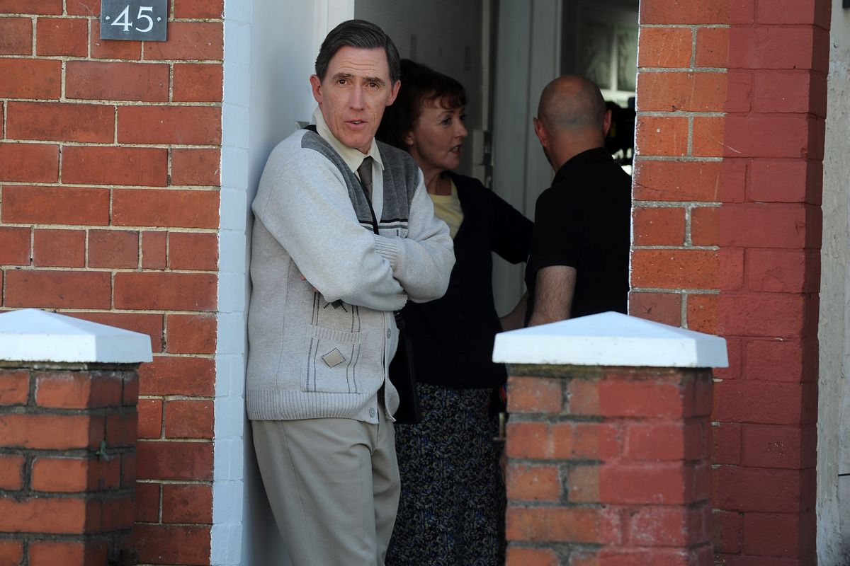 Rob Brydon, in character as Uncle Bryn, outside the house