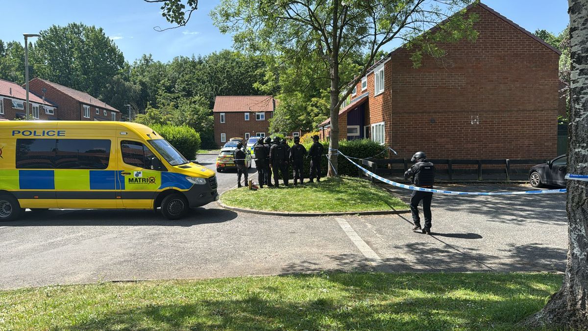 A large police cordon is in place