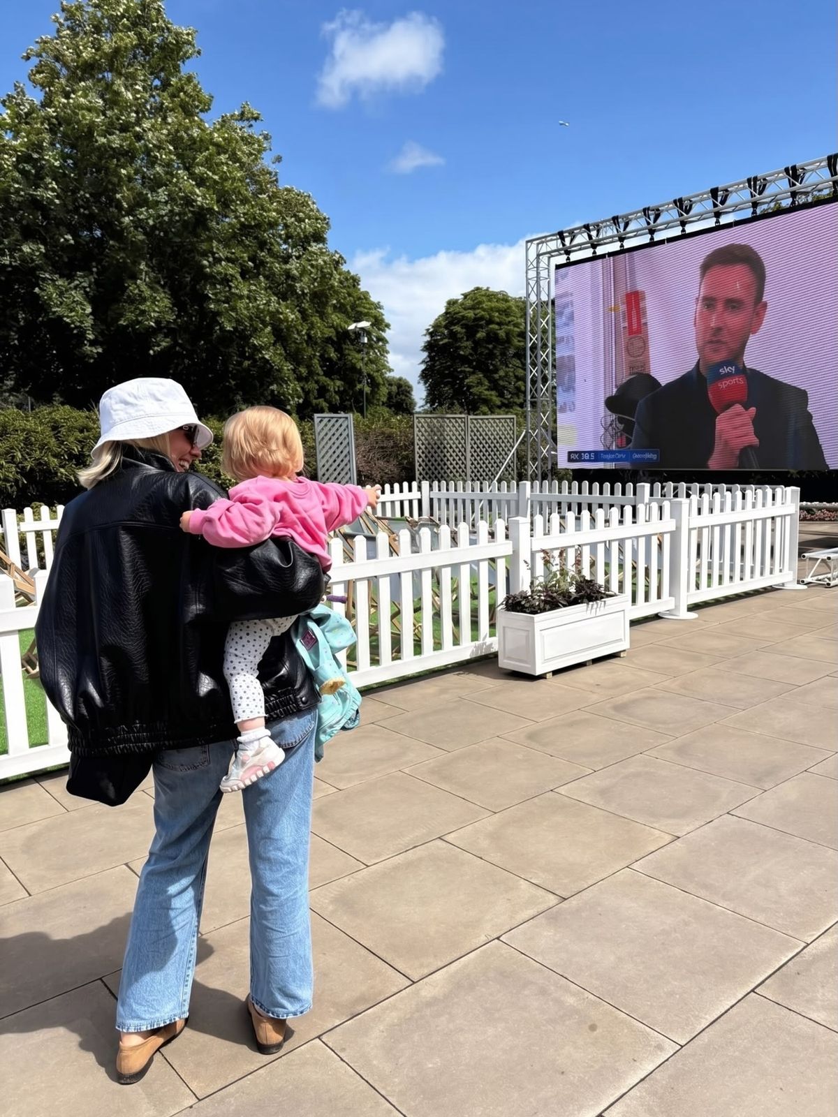 Mollie and her daughter watching Stuart on the telly