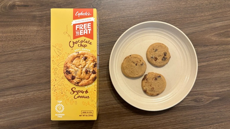 Cybele's Free To Eat Chocolate Chip Cookies box and gluten-free cookies on brown plate