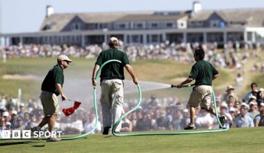 Greenstaff watering the par-three seventh green during the final round of the 2004 US Open at Shinnecock Hills, New York.
