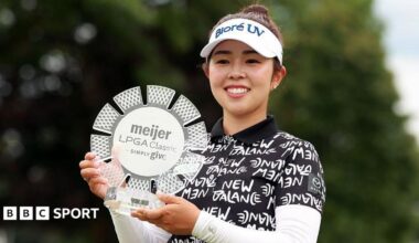 Miyu Yamashita holds the trophy after winning the Meijer LPGA Classic in 2026